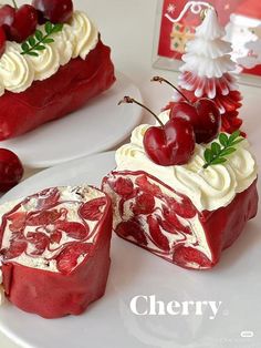 there is a piece of cake with cherries on it and the rest of the cake has white frosting