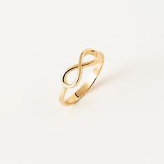 Infinity women ring in 14k Solid Gold,  Minimalist band for wedding gift, Infinity Symbol Ring for mom, Dainty Gift for Her Embrace the symbol of infinity with our meticulously crafted 14k Solid Gold Infinity Ring. This exquisite piece, representing endless love and boundless possibilities, is a perfect blend of minimalist design and timeless elegance. Whether you're searching for a meaningful Mother's Day gift, a special gesture for her, or a way to commemorate an everlasting bond, this infinity shaped ring encapsulates emotions that words alone cannot convey. D E T A I L S❤️ - Our jewelry are ready for you in stock, and also we can make customizable products made to order. - We use 100% 10K/14K/18K Solid Gold - Choice of Gold Color: Yellow Gold, Rose Gold, White Gold - Ready to Ship 1-2 Ring For Mom, Gold Infinity Ring, Infinity Ring, Infinity Symbol, Endless Love, Women Ring, Gold Rose, Ring Designs, Wedding Gift