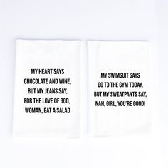 two napkins with words on them sitting next to each other in front of a white background