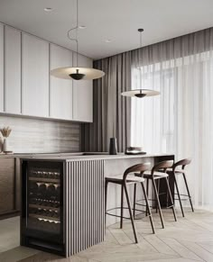 a modern kitchen with white cabinets and bar stools next to the wine cooler in the center