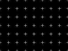 a black and white pattern with crosses on it