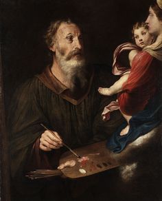 an old man holding a child and painting with paintbrushes in front of him