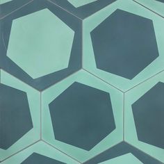 an abstract painting of hexagonal shapes in blue and green