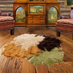 an image of a living room setting with leather chairs and rugs on the floor