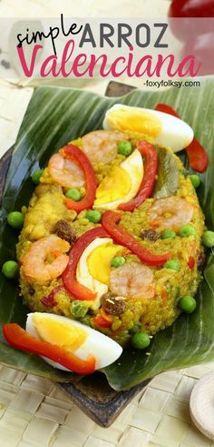 an image of food on a plate with text overlay that reads simple arroz valencana