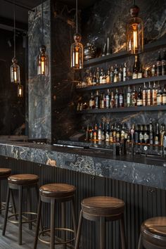 the bar has several stools in front of it