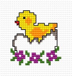 a cross stitch pattern with an image of a yellow duck sitting on top of flowers