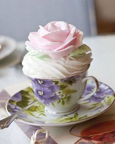 a cupcake sitting on top of a saucer