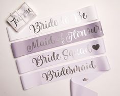 CHOOSE YOUR OWN WORDING / METALLIC PRINT COLOUR / ADD EMOJIS *Listing is for one sash only* These sashes are perfect for your hen's, bachelorette parties, bridal showers and birthday parties. Available in 12 colours Beautifully printed in premium metallic foil on 75mm width grosgrain ribbon, in your choice of printing colour; Gold | Silver | Rose Gold Includes exclusive Le Rose heart pin that allows for the sash to be secured and the size to be adjusted. The pin colour is matched back to your printing colour. Arrives beautifully packaged with matching ribbon colour HOW TO ORDER 1. Select the quantity required 2. Choose the colour of the sash required (if multiple sash colours are required you can choose any colour and advise colours in the buyers notes) 3. Choose the print colour required Hen Party Sash, Bridal Shower Sash, Bachelorette Party Sash, Bridal Robe Lace, Bachelorette Sash, Custom Sash, Lace Bridal Robe, Birthday Sash, Bride To Be Sash