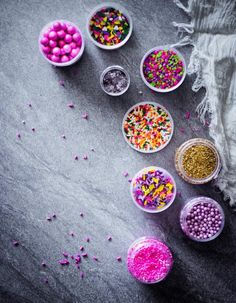 small bowls filled with sprinkles and candy