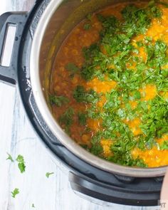 the food is being cooked in the pot on the stove top, ready to be eaten