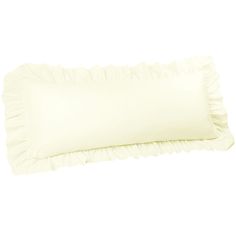 a white pillow with ruffles on it