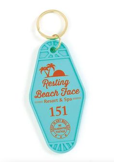 a keychain with the words resting beach place resort and spa on it