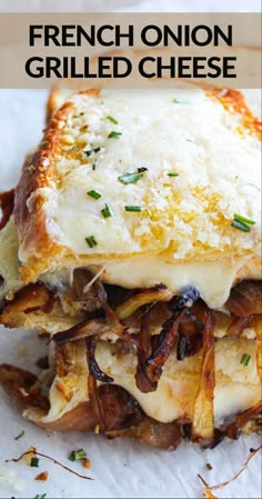 the french onion grilled cheese sandwich has been cut in half and is topped with melted cheese