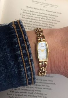 This is a really stunning vintage ladies watch by Accurist in wonderful condition. The bezel is gold and rectangular in shape with a white dial. Tiny diamanté mark each hour and the hands are gold in tone. The bracelet is very simple and elegant and measures 18cm in length. The watch comes with two extra links if you should ever wish to extend the bracelet. This will add another 2cm to the length.  The bracelet is secured with a clasp. This timepiece is battery operated snd comes complete with a Vintage Watches Women, Bracelet Watches Women, Women Wrist Watch, Ladies Watch, Jewelry Inspo, White Dial, Wrist Watches, Battery Operated, Vintage Watches