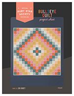 the book cover shows an image of a colorful quilt