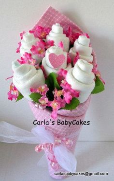 pink and white baby cakes in a bouquet