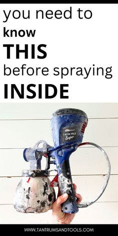 a person holding a paint sprayer with the words you need to know this before spraying inside