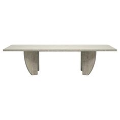 a white table with two curved legs on it's end, against a white background