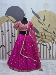 Fabric : 👉 Taffeta silk lehenga with sequence & zari work  ( 3 meter flair ) 👉 Taffeta silk blouse with sequence work all over front & back ( Unstitch ) 👉 Net Dupatta with sequence work & border work CARE INTRODUCTION:- HAND WASH \ ONLY DRY AND CLEAN What is meaning of semi stitched Product :- Semi stitch lehenga means that the pattern of the lehenga is ready and only the fitting of the lehenga as per your waist and height(waist to floor) has to be done. The blouse(Choli) of lehenga is UN-sti Eid Tissue Silk Lehenga With Cutdana, Pink Party Wear Choli With Cutdana, Pink Tissue Silk Lehenga With Unstitched Blouse, Pink Tissue Silk Lehenga For Diwali, Festive Pink Lehenga In Tissue Silk, Diwali Pink Tissue Silk Lehenga, Festive Pink Tissue Silk Lehenga, Semi-stitched Art Silk Lehenga With Self Design, Silk Lehenga For Reception And Festivals