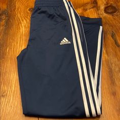 New Without Tags Boys Size Pockets Elastic Draw String Waist Stretch Blue Bottoms With Three Stripes, Blue Cotton Pants With Three Stripes, Adidas Blue Sweatpants For Sports, Adidas Sporty Blue Sweatpants, Adidas Blue Cotton Pants, Adidas Blue Sweatpants, Blue Adidas Sweatpants With Pockets, Adidas Blue Sweatpants With Pockets, Adidas Blue Sporty Sweatpants