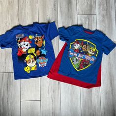 Brand New! Two Boys Paw Patrol Short Sleeve Tops. One Has Attached Cape That Is Removable. "Small But Tough" Top Is Size 5t Blue T Shirt Is 4t Blue School Tops With Character Print, Blue Character Print Tops For School, Blue Character Print School Tops, Red Cartoon Print Tops For Playwear, Fun Blue Tops For School, Paw Patrol Shirts, Paw Patrol Shirt, Paw Patrol Girl, Paw Patrol Pups