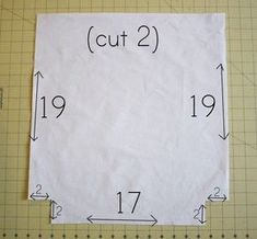 a piece of paper with cut numbers on it