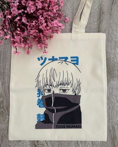 JUJUTSU KAISEN: INUMAKI TOTE BAG Carry your essentials with this amazing JJK tote bag! Featuring Toge Inumaki, this bag can be used for any type of occasion: shopping, school, university, beach day, traveling. Use it as you wish and give a unique and special touch to your outfit. Get yours today! Vintage Beige Approx. 15 x 13 inch Canvas Hand Wash Only Jujutsu Kaisen Inumaki, Beach Day, Jujutsu Kaisen, Jujutsu, Your Outfit, University, Hand Wash, Tote Bag, Canvas