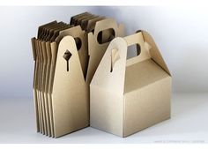 some brown paper bags with holes in them