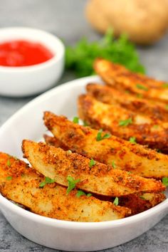 some fried food in a white bowl on a table