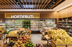 a store filled with lots of fresh fruits and vegetables