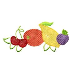 three different fruits and vegetables are shown in this appliqued design on a white background