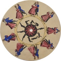 an image of a plate with people dancing around it