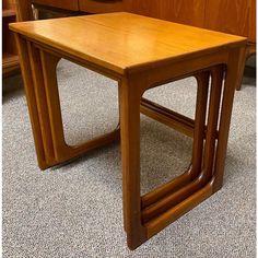 Mid Century Modern Teak Nesting Tables c.1960  Set of Three Tables -Convenient Nesting Design  22″ Wide x 12″ Deep x 19″ High (outer table)  Very nice vintage condition Wood Nesting Side Tables, Wooden Nesting Tables, Solid Wood Nesting Tables, Mid Century Nesting Tables, Mid Century Modern Side Table Two Tier, Nesting Tables, Century Modern, Teak, Mid-century Modern