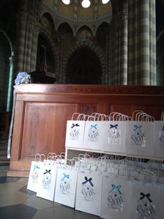 several bags are lined up in front of the alter