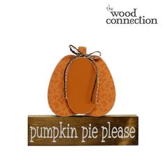 the wood connection pumpkin pie please sign is on top of a wooden plaque that says,