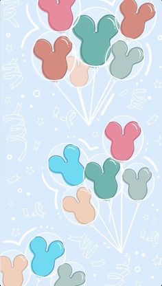 an image of mickey mouse balloons in the shape of hearts on a light blue background