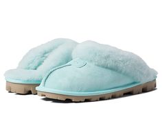 UGG Coquette - Women's Slippers : Sky : This shoe runs big and is available in whole sizes only. Order one size down than usual and if between sizes, order 1 1/2 sizes down from your usual size (for example, if you wear a size 9 1/2, order a size 8). The Coquette embraces the essence of a slipper with the radiant style UGG is known for. Signature Twinface upper with a sheepskin cuff for a cute can cozy wear. UGG signature Twinface sheepskin is treated on both sides to provide maximum softness an Ugg Coquette Slippers, Cute Uggs, Ugg Coquette, Can Cozy, Pretty Sneakers, Cozy Wear, Preppy Shoes, Pretty Shoes Sneakers, Fashion Shoes Heels