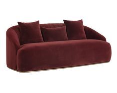 a red couch sitting on top of a white floor