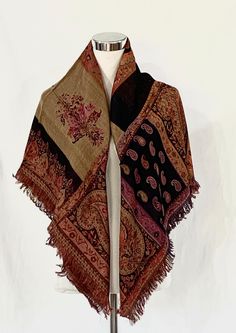 "Effortlessly transform a simple look into chick look with this natural wool and silk blend reversible Jacquard shawl/scarf.  This paisley pattern shawl/scarf in shades of Black,Orange red, Beige and purple. This shawl has been expertly hand woven in Kashmir, using traditional techniques, to bring you a truly beautiful, timeless traditional paisley Jacquard shawl you will use time and time again. Use this shawl in any way such as a shawl/wrap/scarf during the winter, a piece of decor for the hou Pashmina Shawl One Size, Winter Paisley Print Pashmina Shawl, Winter Pashmina Shawl With Paisley Print, Fall Pashmina Dupatta, Winter Paisley Print Pashmina Scarf, Winter Paisley Print Pashmina Scarves, Fall Bohemian Pashmina Shawl In One Size, Winter Pashmina Scarf With Paisley Print, Fall Pashmina Scarf With Paisley Print