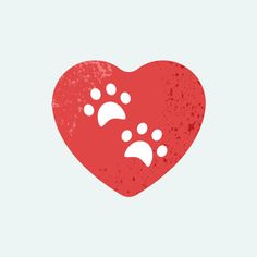 a red heart with paw prints on it