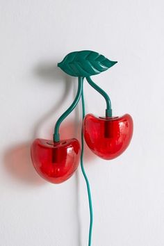 The cherry on top of your lighting display, this sconce infuses your space with whimsical appeal. Features a stem of cherries with translucent red shades that diffuses a vibrant glow throughout. Plugs in to power on. Available exclusively at Urban Outfitters. Features Shaped sconce Cherry silhouette Translucent red shades Plug in Requires 2 E12 LED 6W bulbs - not included UO exclusive Content + Care Glass, iron Wipe clean Imported Made in compliance with US electrical standards. To use this item Red Shades, Uo Home, Back To College, Cherry On Top, Teen Room, Dream Decor, Dream House Decor, My New Room, Dream Room