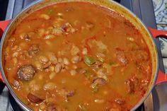 a large pot filled with lots of food on top of a stove