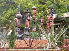 an assortment of decorative objects in a garden