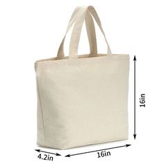 a white canvas bag with measurements for the handles and sides, on a white background