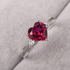 ◆ The ring is handcrafted from sterling silver and decorated with a dazzling 8*8 mm ruby and CZs. It is suitable for engagement/anniversary/daily occasion. ◆ Production Description: Main stone Type: Lab Ruby Main Stone Shape: Heart Cut Main Stone Size: 8*8 mm(2.59ct) Side stone: CZ Metal: 925 Sterling silver - Other options available in the drop down menu ◆ Customization: √Free for Add Engraving √Other Metal Type Available √Other Gemstones & Shapes Available √Personalization Requests Available ◆ Sterling Silver Ruby Rings, Heart Shaped Ruby Ring, Elegant Diamond Crystal Ring For Valentine's Day, Elegant White Gold Crystal Ring For Valentine's Day, Valentine's Day Solitaire Diamond Jewelry, Heart-shaped White Gold Birthstone Ring For Valentine's Day, Valentine's Day Promise Crystal Ring In Fine Jewelry Style, Elegant Red Heart-shaped Diamond Ring, Valentine's Day Promise Crystal Ring Fine Jewelry