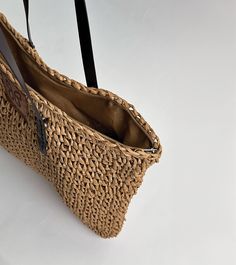 Embark on a journey of coastal elegance with our stunning Aria woven raffia tote, embodying the essence of Mediterranean living. Meticulously handcrafted with detailed raffia weaving and featuring sturdy brown handles, this tote exudes an aura of refined sophistication. Embrace the enchanting spirit of the Mediterranean with this indispensable accessory, a harmonious fusion of craftsmanship and style destined to captivate admirers. Raffia Weaving, Mediterranean Living, Italy Gift, Coastal Elegance, Woven Raffia, Comfortable Sneakers, Flat Sneakers, Espadrilles Wedges, Flat Sandals