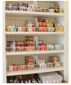 an organized pantry filled with canned food