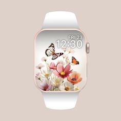 an apple watch with flowers and butterflies on the screen, against a light pink background