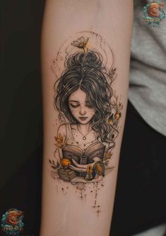 a girl reading a book with butterflies on her arm